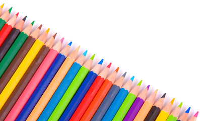Colored pencils on a white background, studio shot