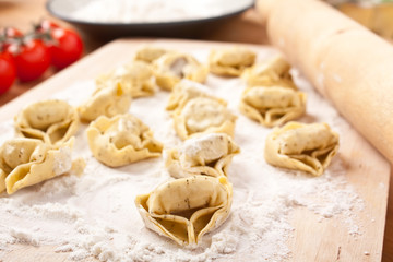 Fototapeta na wymiar raw stuffed tortellini pasta