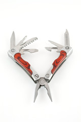 Multitool isolated on a white background