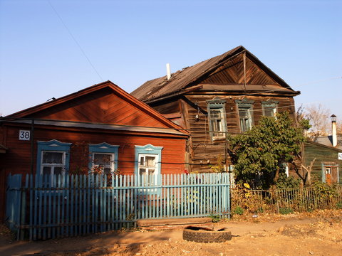 An old village houses against a blue sky in autumn