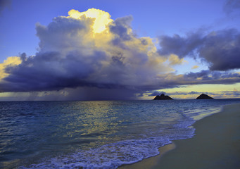 late afternoon offshore rainstorm at lanikai beach, hawaii