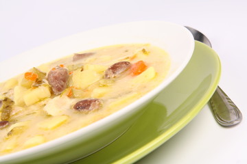 Pickled cucumber soup with some giblets (hearts),Polish cuisine