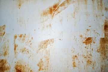 Grey grunge metal surface with scrathces and rusty stains