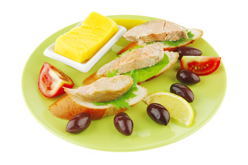 salmon pieces on baguette slices