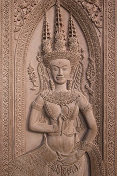 Apsara engraved on a stone