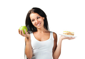Cool girl with fruit and cake in her hands