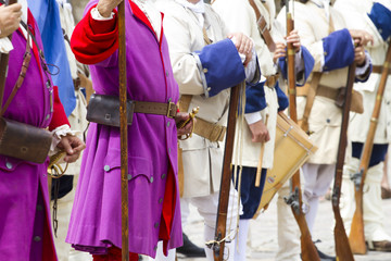 Soldier with carabiner and jacket during the re-enactment of the