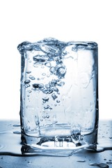 water drops in glass over white
