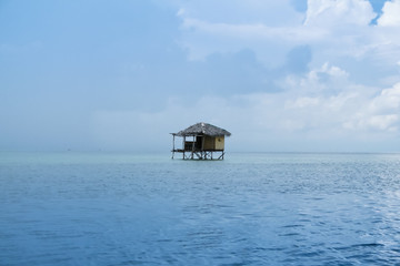 stilt house over ocean palawan
