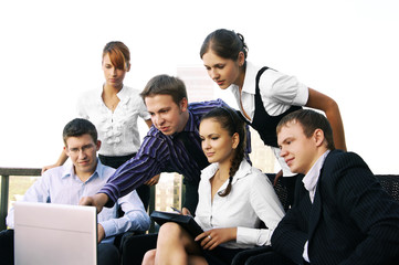 Fototapeta premium A group of six business persons is working with a laptop