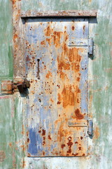 Old rusted garage wicket