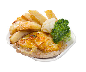 chops with potatoes on plate.closeup
