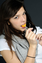 brunette woman eating sweets