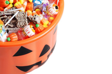 top view halloween pumpkin pail with candy