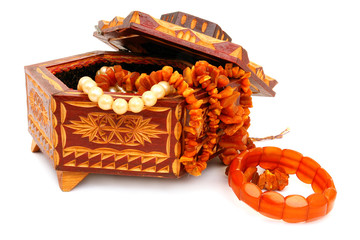 The wooden casket and amber