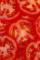 Fresh natural tomato slice to background