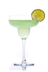 Green alcohol cocktail with green lime isolated on white