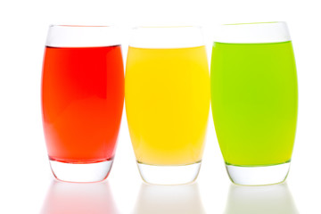 colorful cocktails with fruit isolated on white