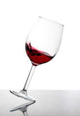 A glass of red wine - 25733588