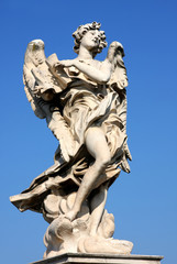 Fototapeta na wymiar Regnavit Ligno Devs on bridge Castel Sant' Angelo, Rome