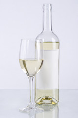 Bottle and glass of white  wine