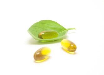 Healthy life concept - mint leaves and pills