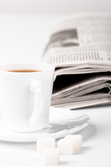 coffee, sugar and newspapers
