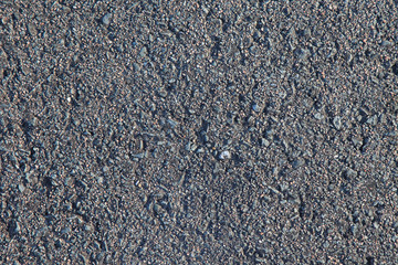 Gray asphalt as textured background or backdrop.