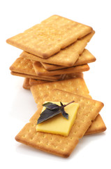 Crackers, cheese and basil