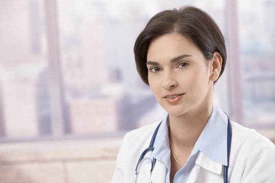 Portrait of attractive young female doctor