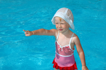 Little girl in swimming pool