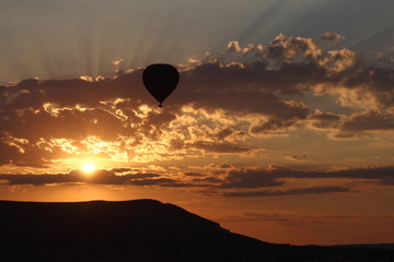 Sunrise and the balloon over Cappadocia