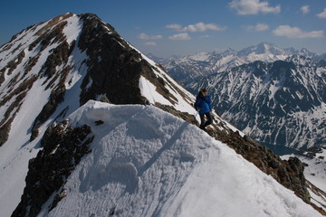 Tourist on the ridge in the Tatra Mountains, Poland