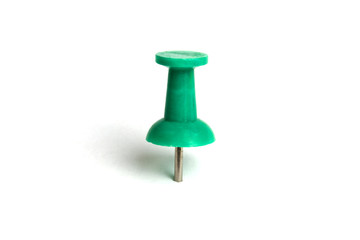 Green push pin isolated on white