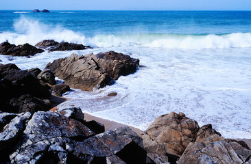Waves breaking on rocky coast