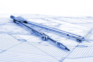 bow compass on blueprint