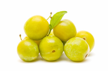 fresh plums on white background