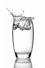 Water splashing into glass