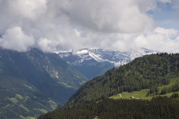 Naklejka premium Clouds over the Alps