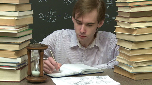 Student is learning his homework. Quick motion