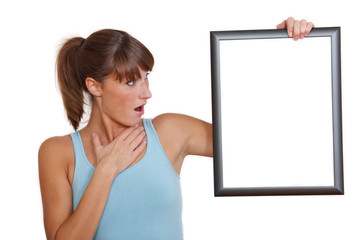 surprised woman with picture frame