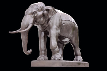 Elephant sculpture isolated on black background