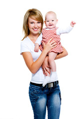 smiling mother with baby on hands