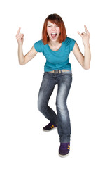 young redhead girl shouting and making punk gesture, full body,