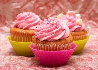 Vanilla cupcakes with strawberry icing