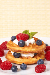 Belgian waffles with berries and cream