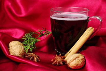 Mulled wine on red fabric (Selective Focus)