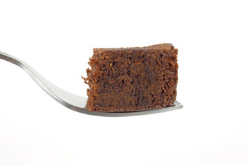 Piece of chocolate cake on fork
