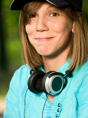 Fototapeta premium Teenage girl with headphones