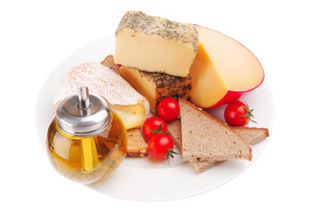 aged cheeses on dish